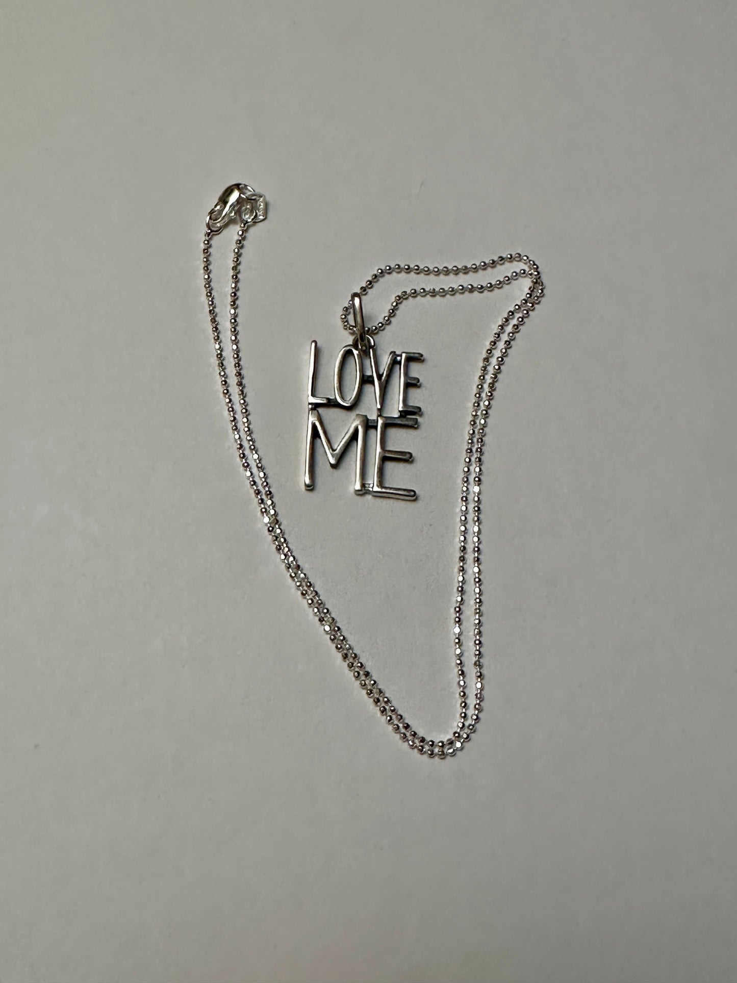 Love Me Pendant Sterling Silver Necklace