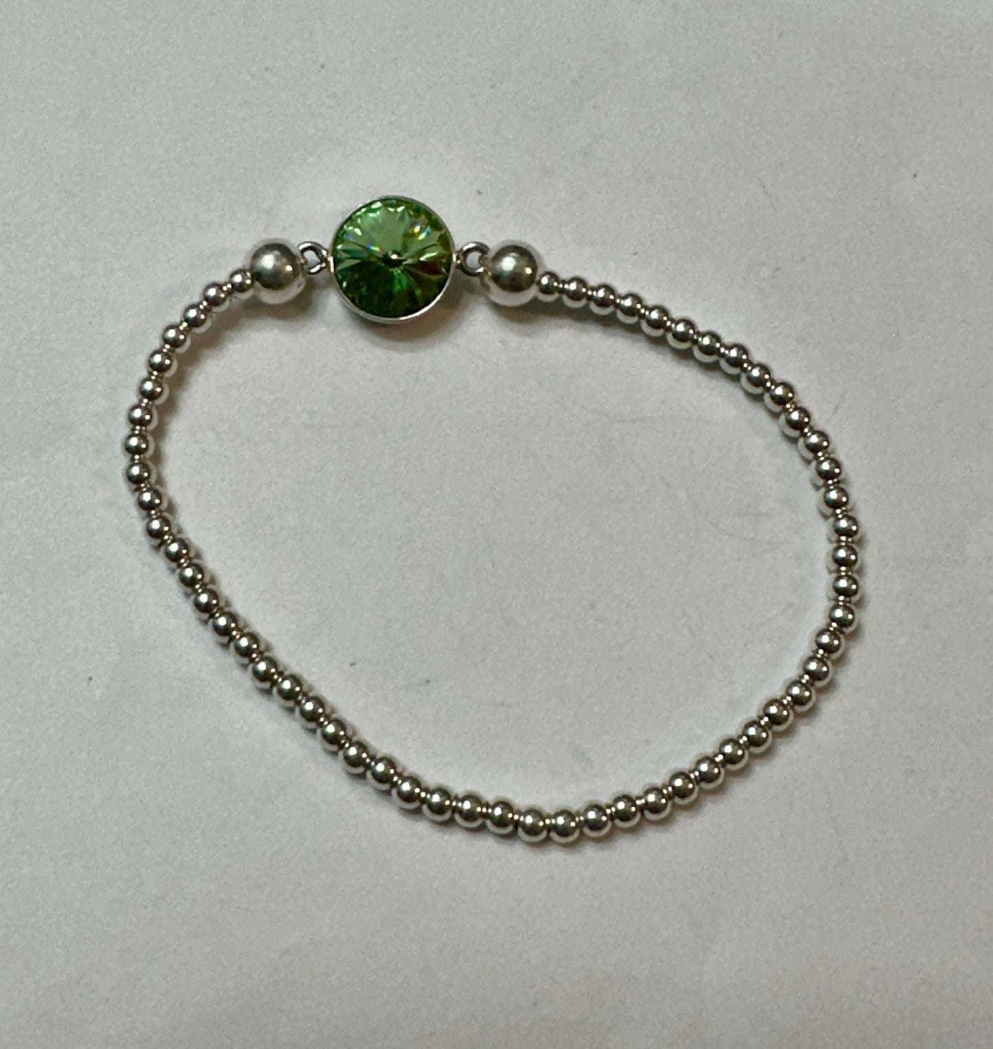 Beaded Sterling Silver Stretch Bracelet w/ Center Crystal Peridot