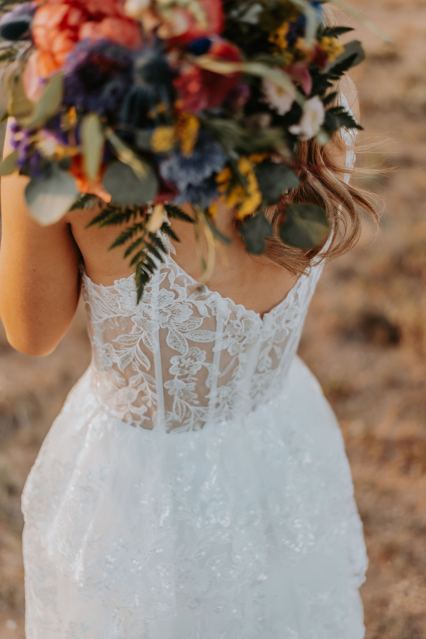 The Harlow Gown – Romantic Tiered Lace Wedding Dress with High-Low Skirt