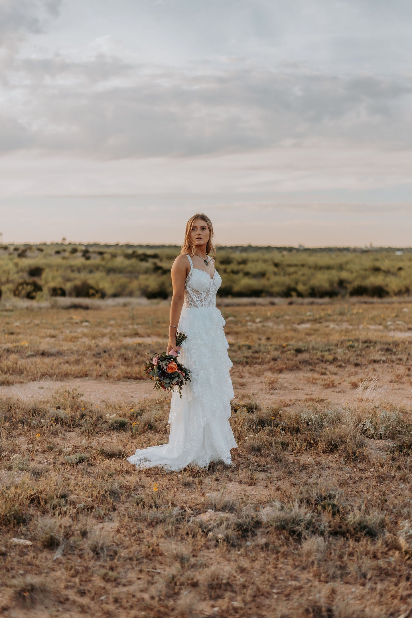 The Harlow Gown – Romantic Tiered Lace Wedding Dress with High-Low Skirt