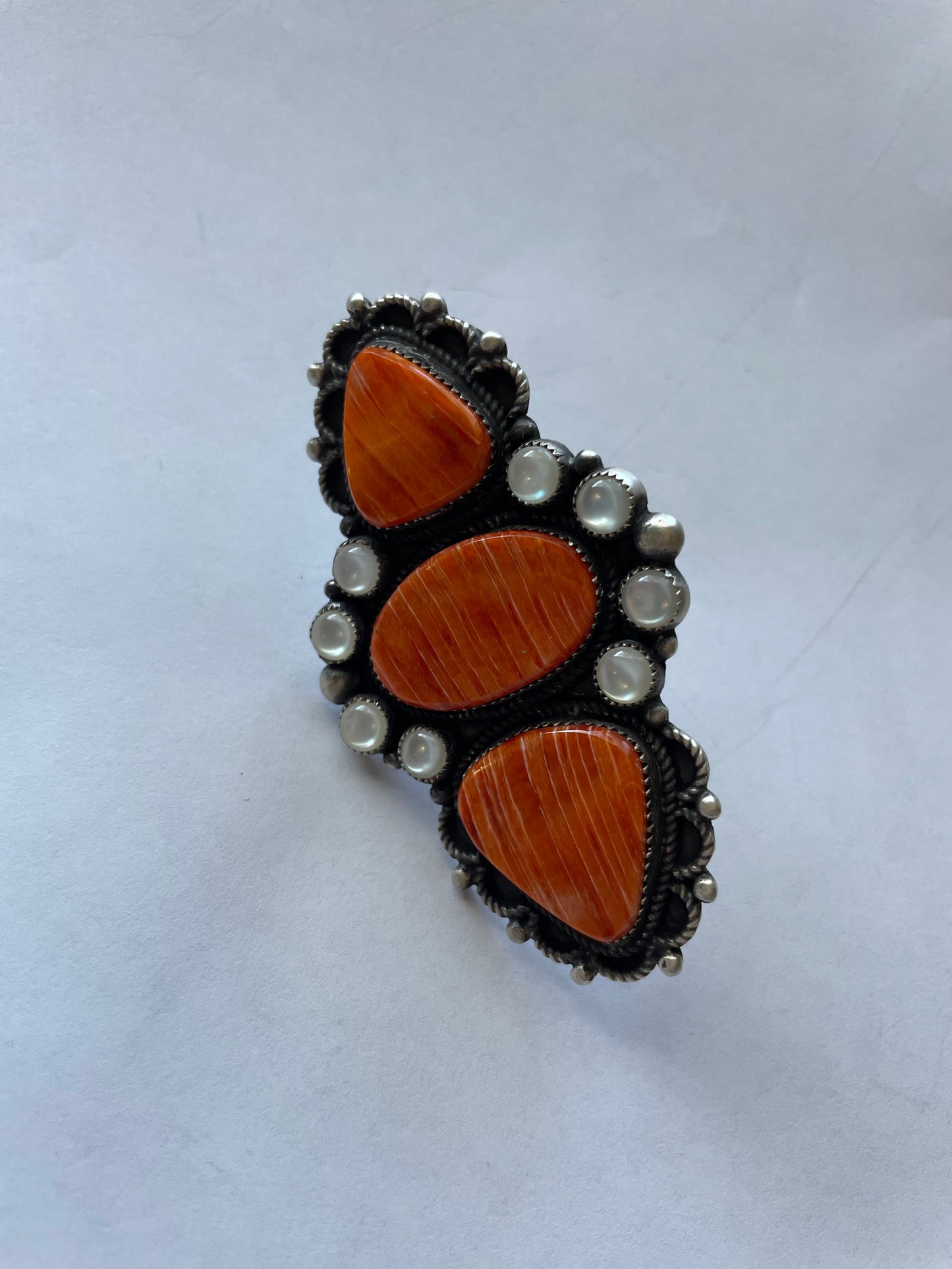 Devon Brown Handcrafted Sterling, Mother of Pearl Orange Spiny ring adjustable