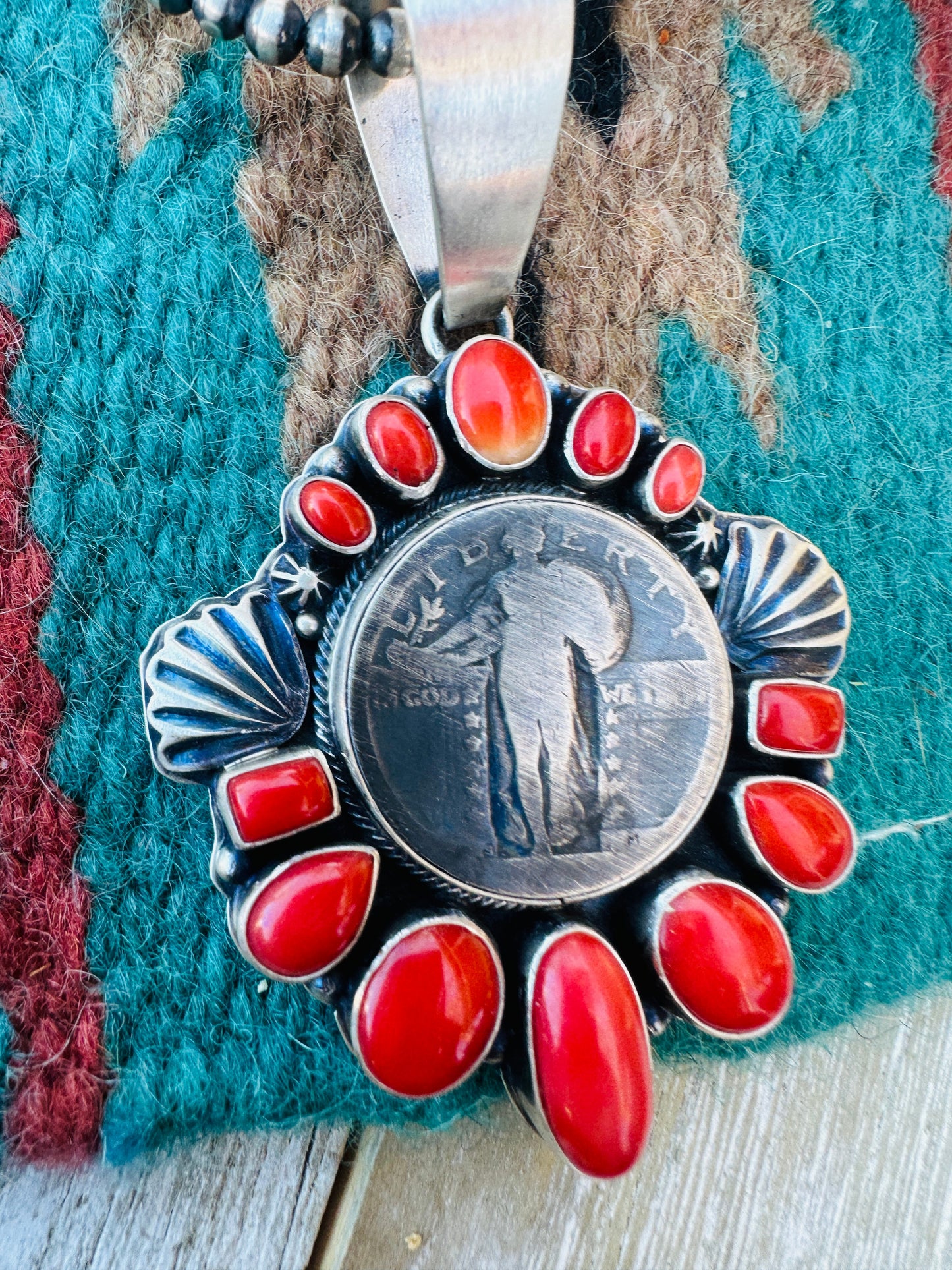 Handcrafted Sterling Silver and Coral Liberty Coin Pendant by Randy Boyd