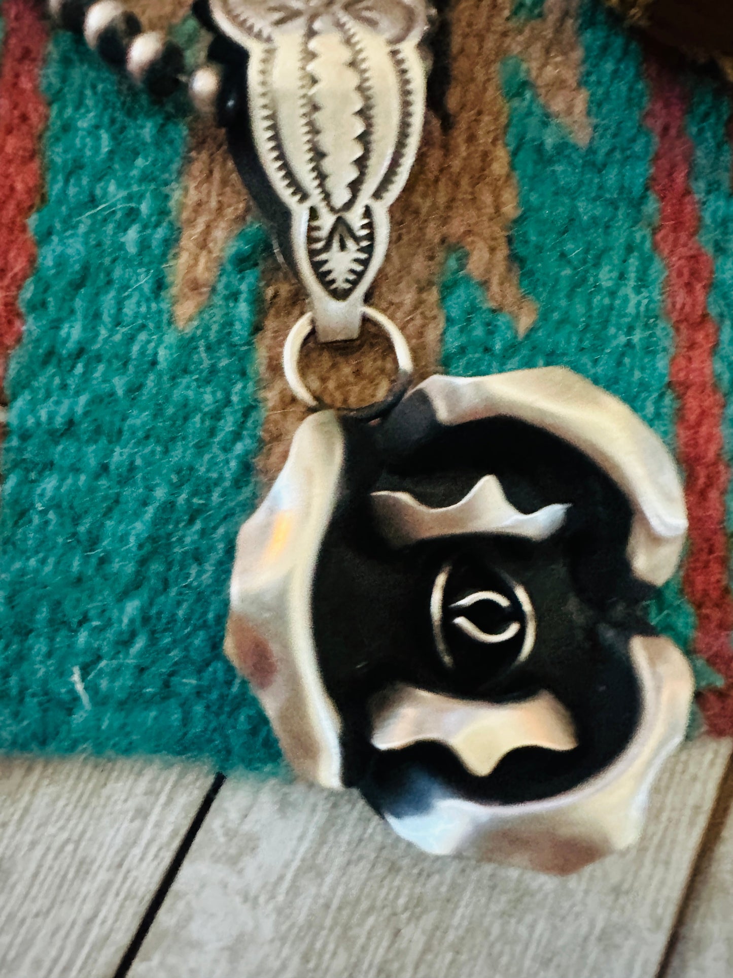 Handcrafted Sterling Silver Rose Pendant by Leander Tahe