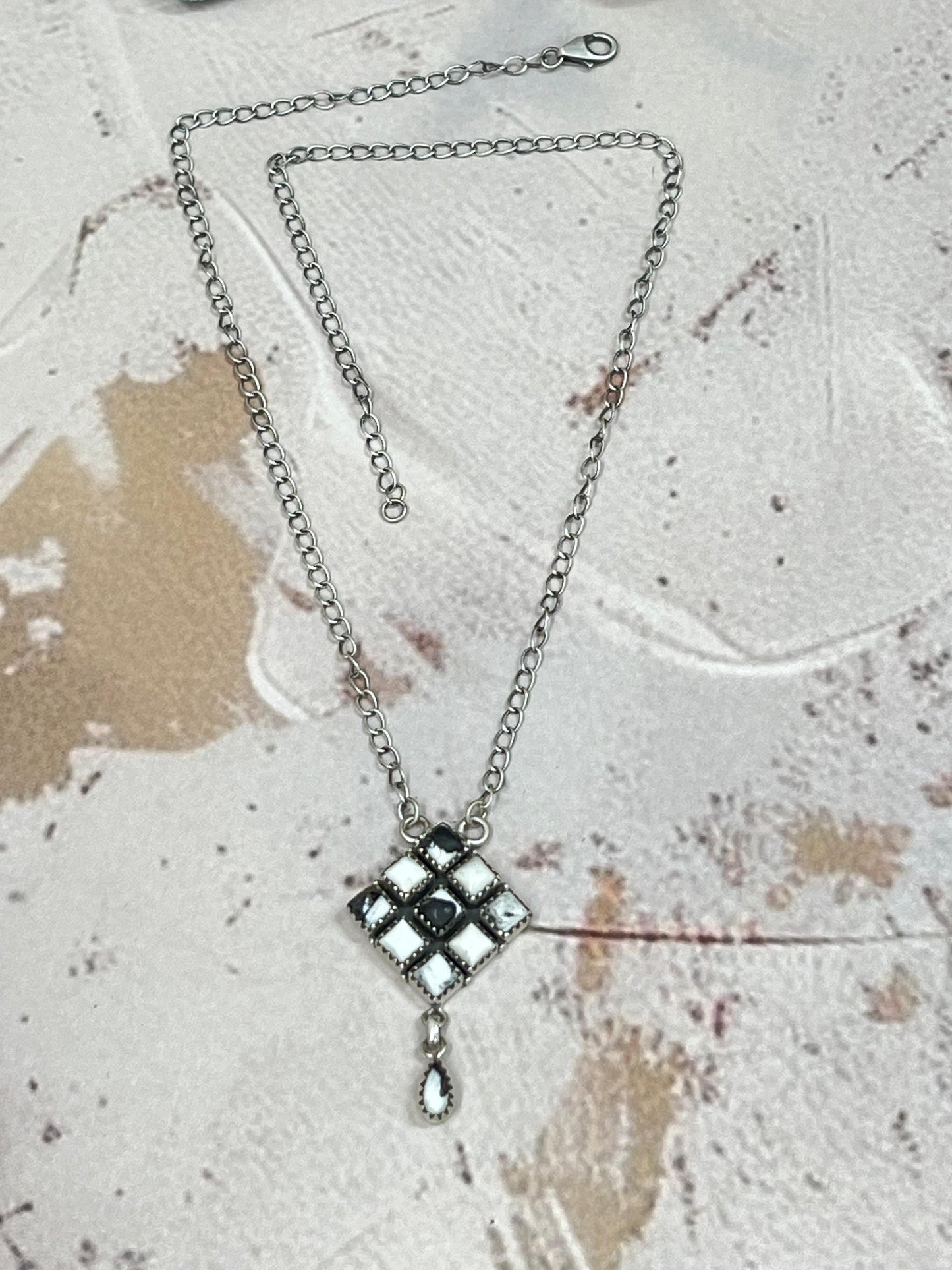 Handmade Sterling Silver White Buffalo Turquoise Necklace with Signed Nizhoni