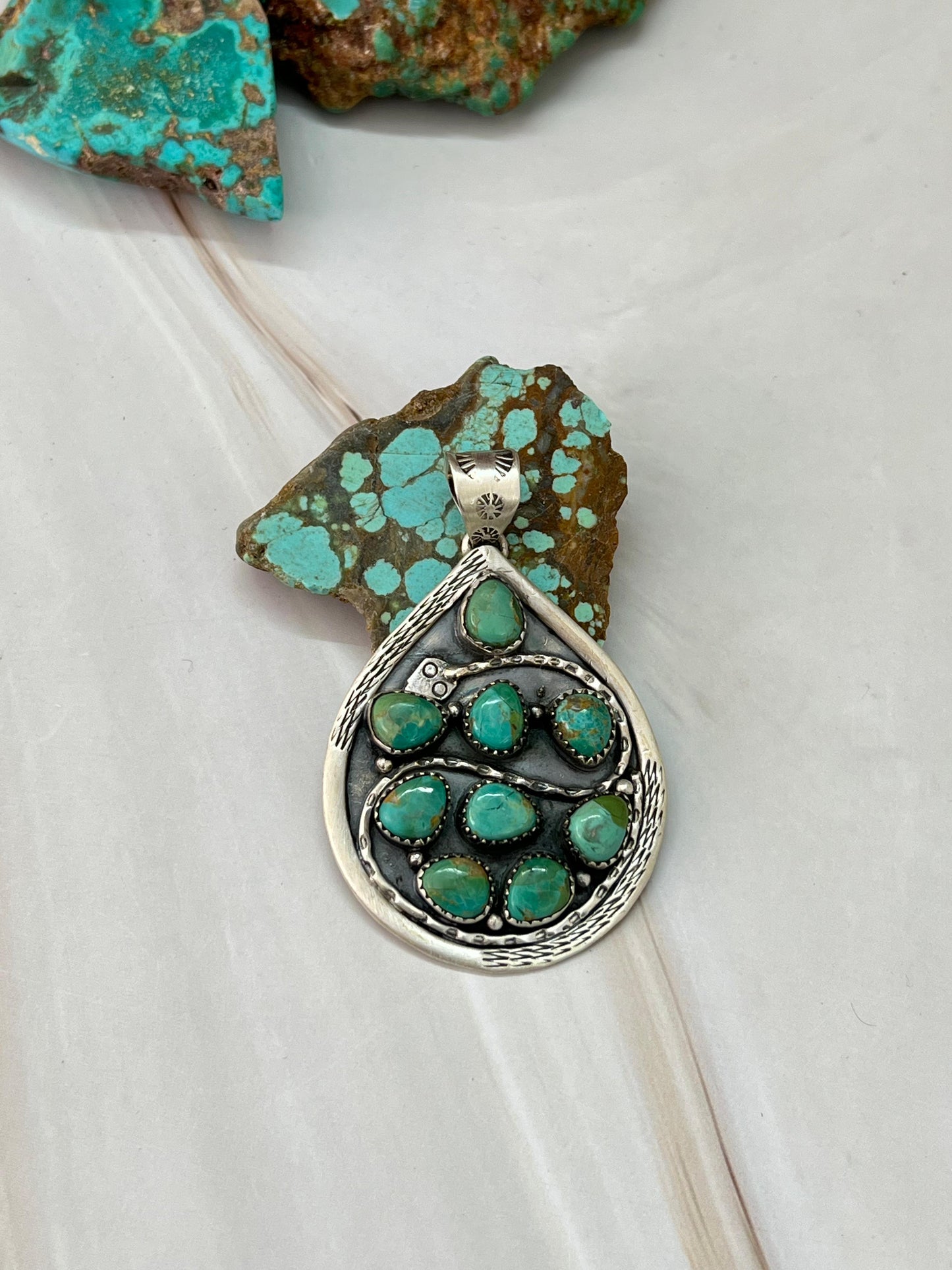 Handmade Sterling Silver Kingman Turquoise Snake Pendant with Signed Nizhoni