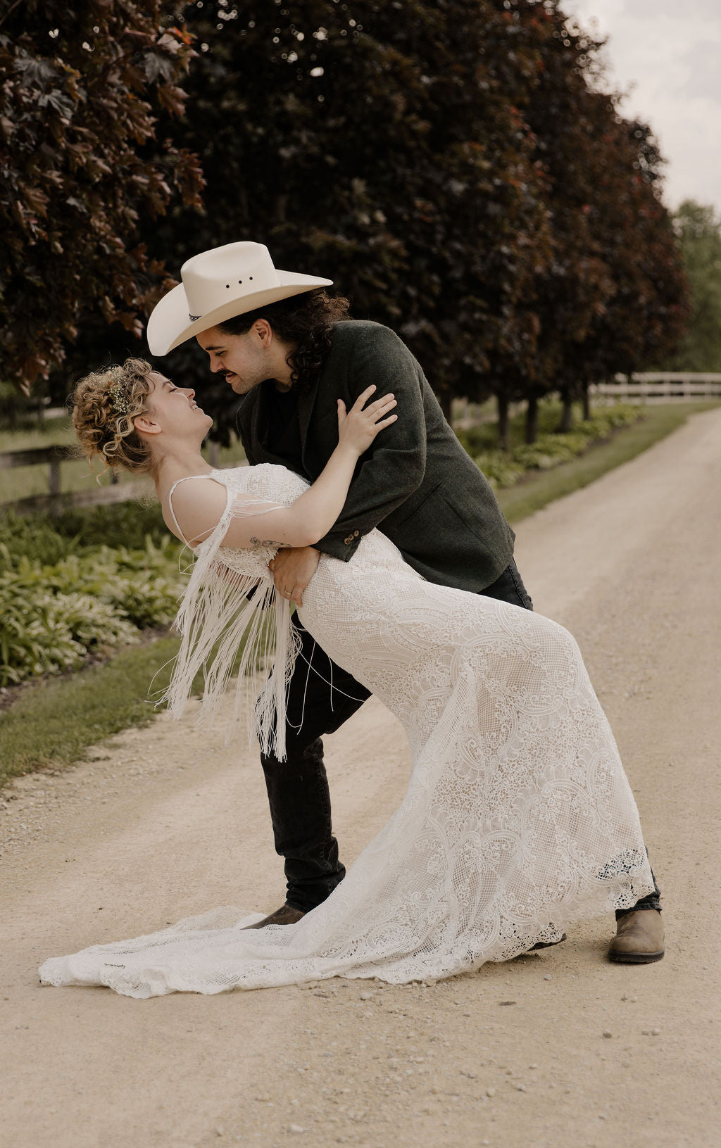 The Malorie Gown Bold Boho Fit-and-Flare Wedding Dress with Fringe Back The Malorie Gown Bold Boho Fit-and-Flare Wedding Dress with Fringe Back