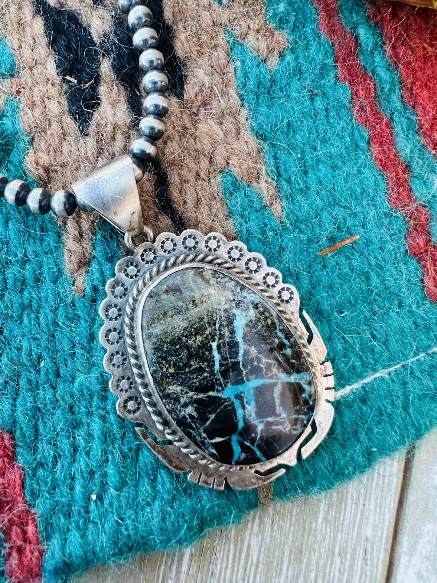 Handcrafted Sterling Silver and Black Jack Turquoise Pendant by Peggy Skeets