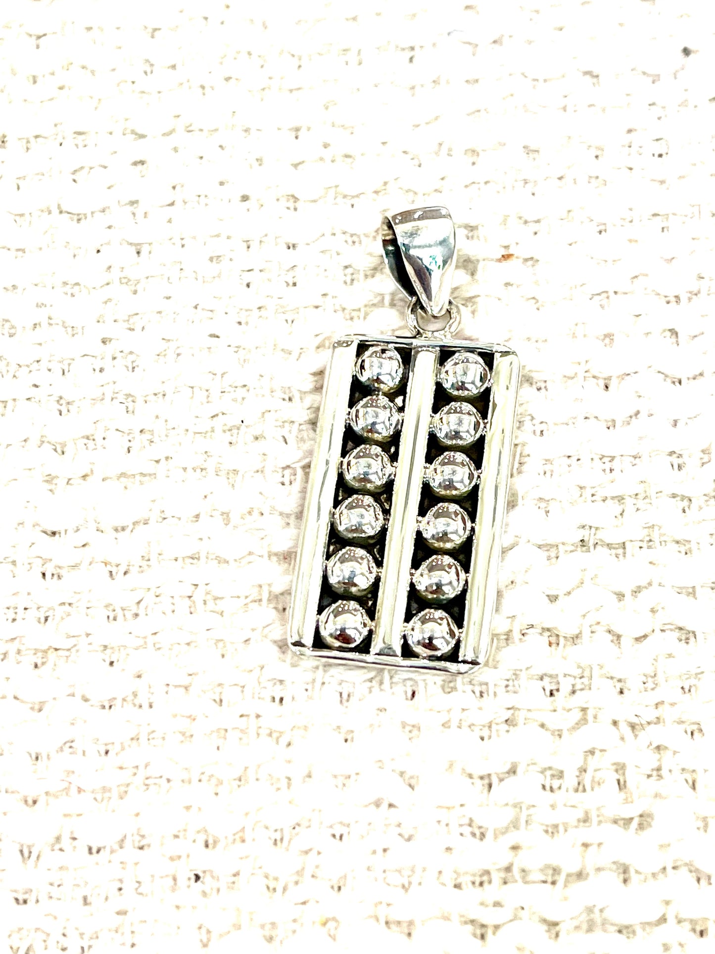 Handmade Sterling Silver Bar Pendant with Signed Nizhoni