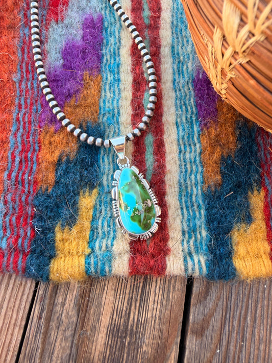 Handcrafted Sterling Silver & Sonoran Mountain Turquoise Pendant by Larry Moses Yazzie