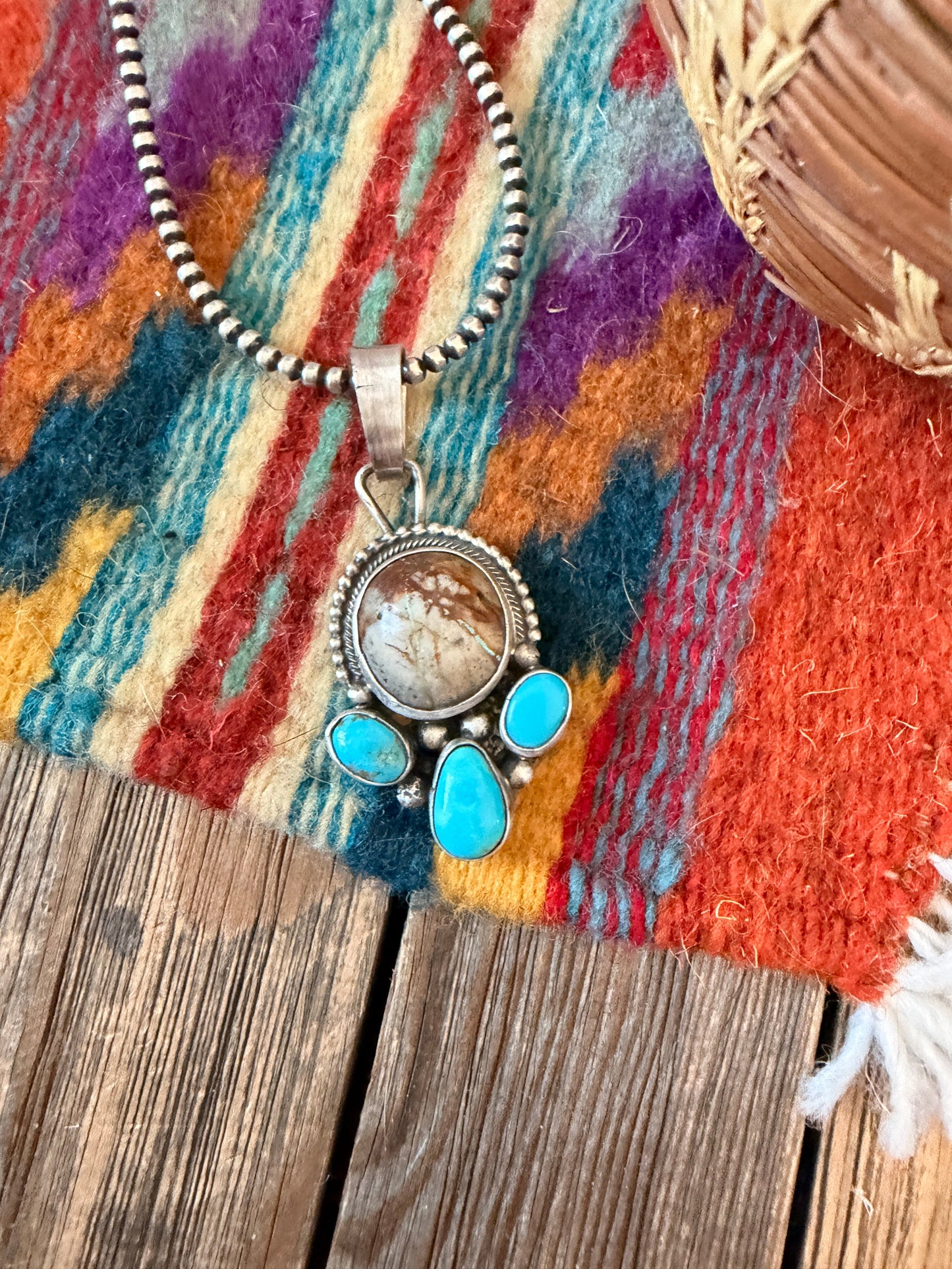 Handcrafted Sterling Silver & Turquoise Pendant by Travis Jim
