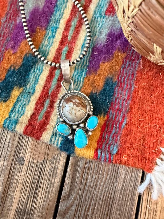 Handcrafted Sterling Silver & Turquoise Pendant by Travis Jim