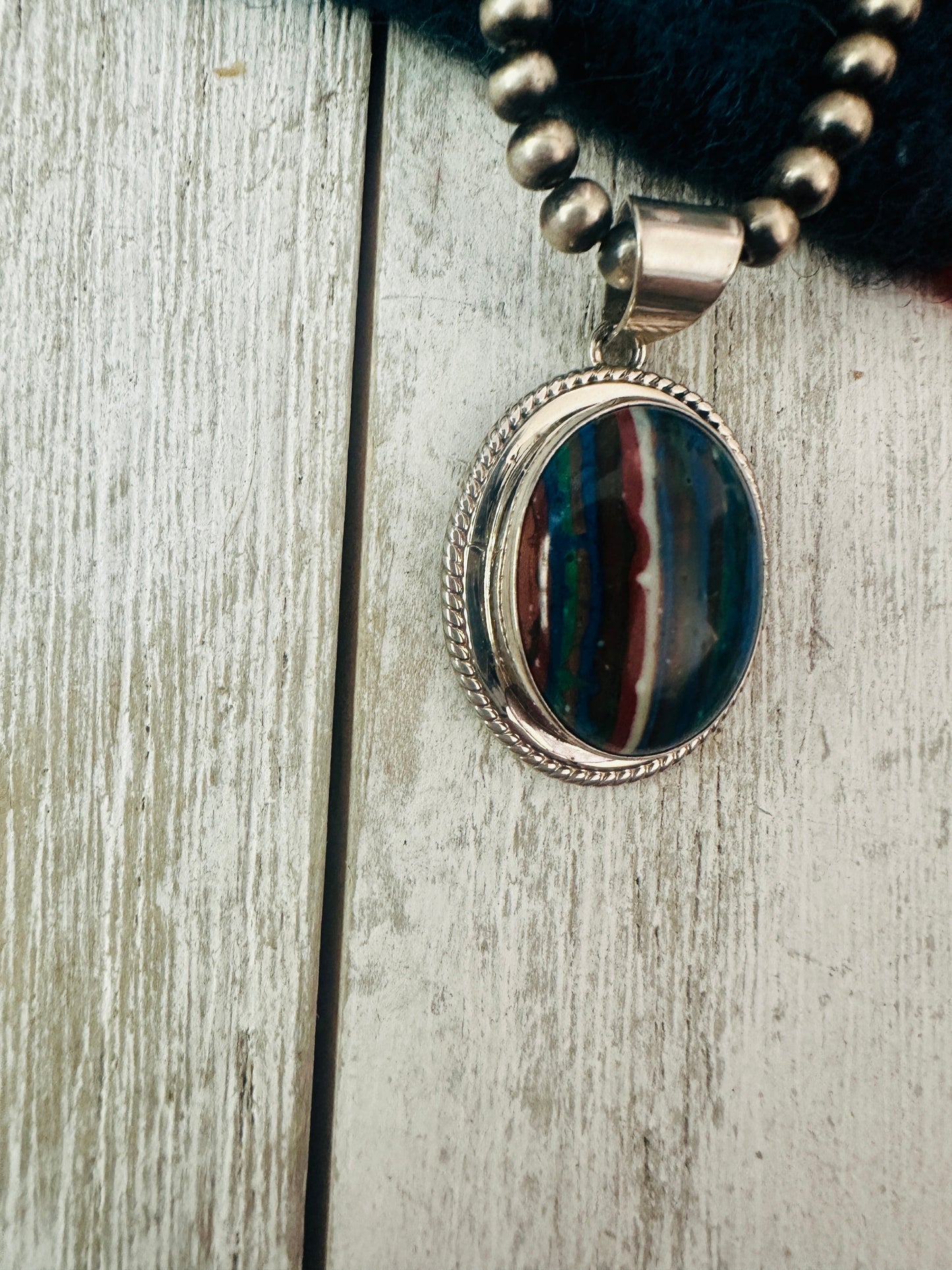 Handcrafted Rainbow Calsilica and Sterling Silver Star Pendant