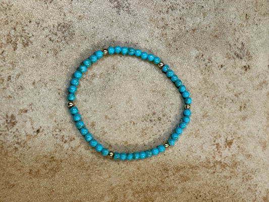 Turquoise Stretch Bracelet With Gold Plated Beads