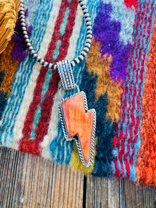 Handcrafted Spiny Oyster & Sterling Silver Lightning Bolt Pendant by Tatum Skeets
