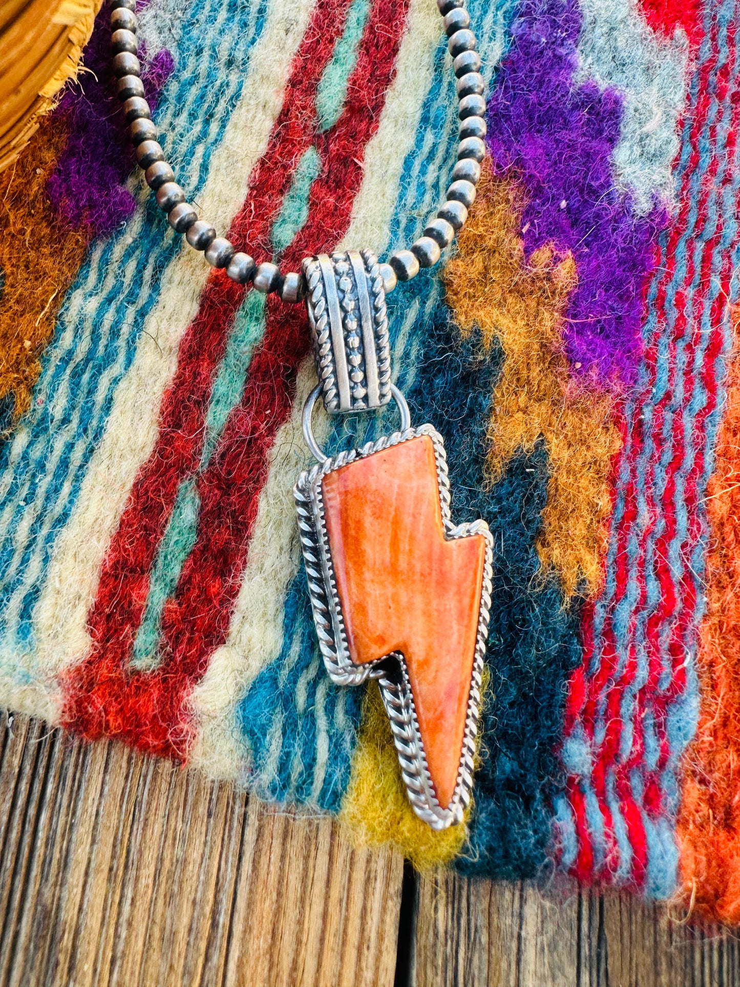 Handcrafted Spiny Oyster & Sterling Silver Lightning Bolt Pendant by Tatum Skeets