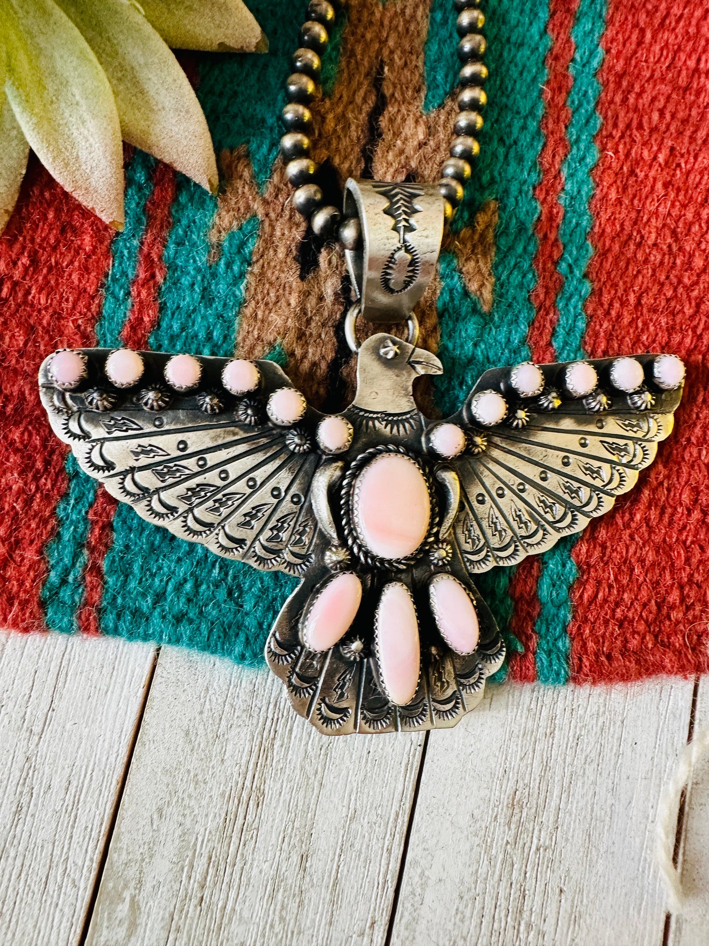 Navajo Queen Pink Conch & Sterling Silver Thunderbird Pendant by Richard Yazzie