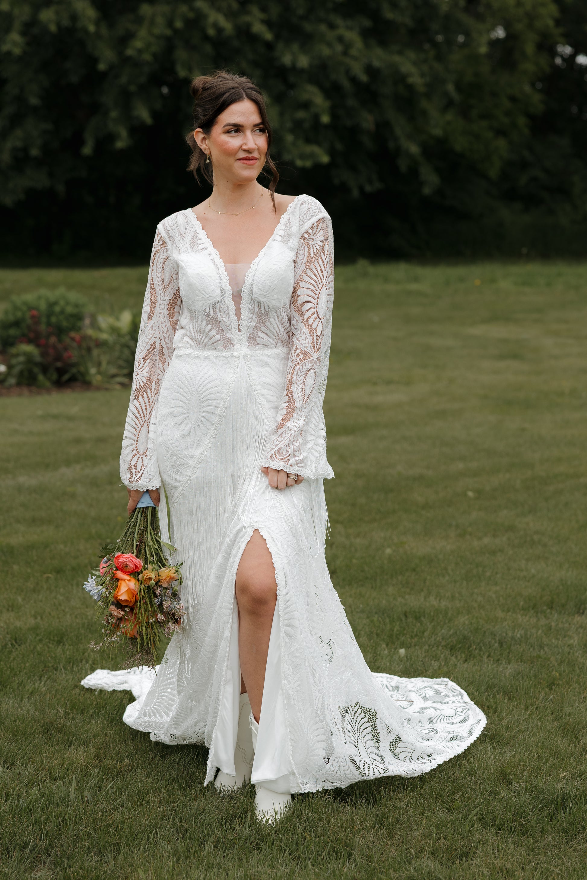 The Bonnie Gown Western Boho Wedding Dress with Split Skirt, Fringe & Fringe Lines Bell Sleeves The Bonnie Gown Western Boho Wedding Dress with Split Skirt, Fringe & Fringe Lines Bell Sleeves