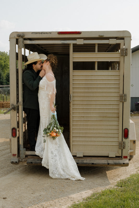 The Malorie Gown – Bold Boho Fit-and-Flare Wedding Dress with Fringe Back