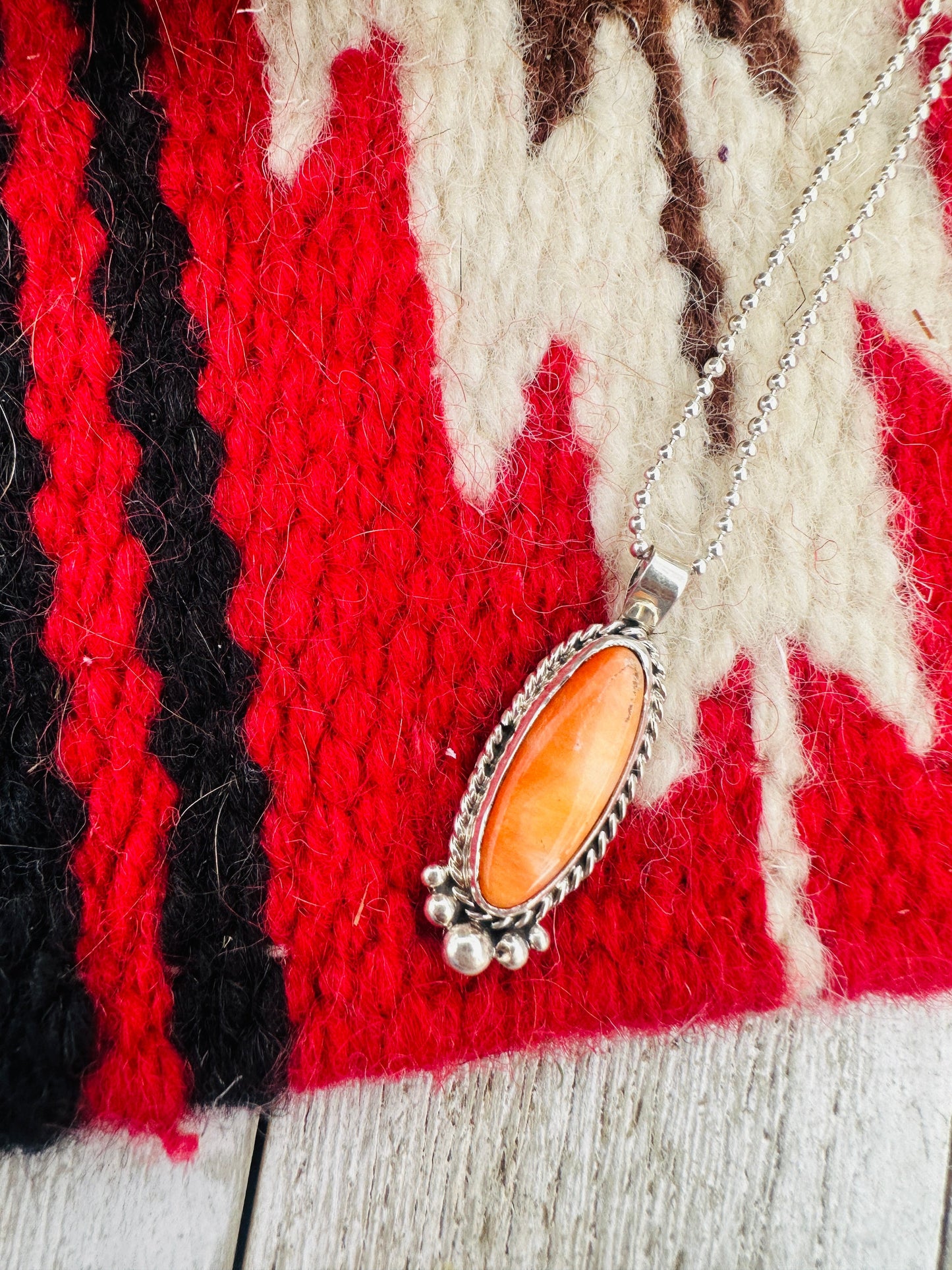 Handcrafted Sterling Silver & Orange Spiny Pendant
