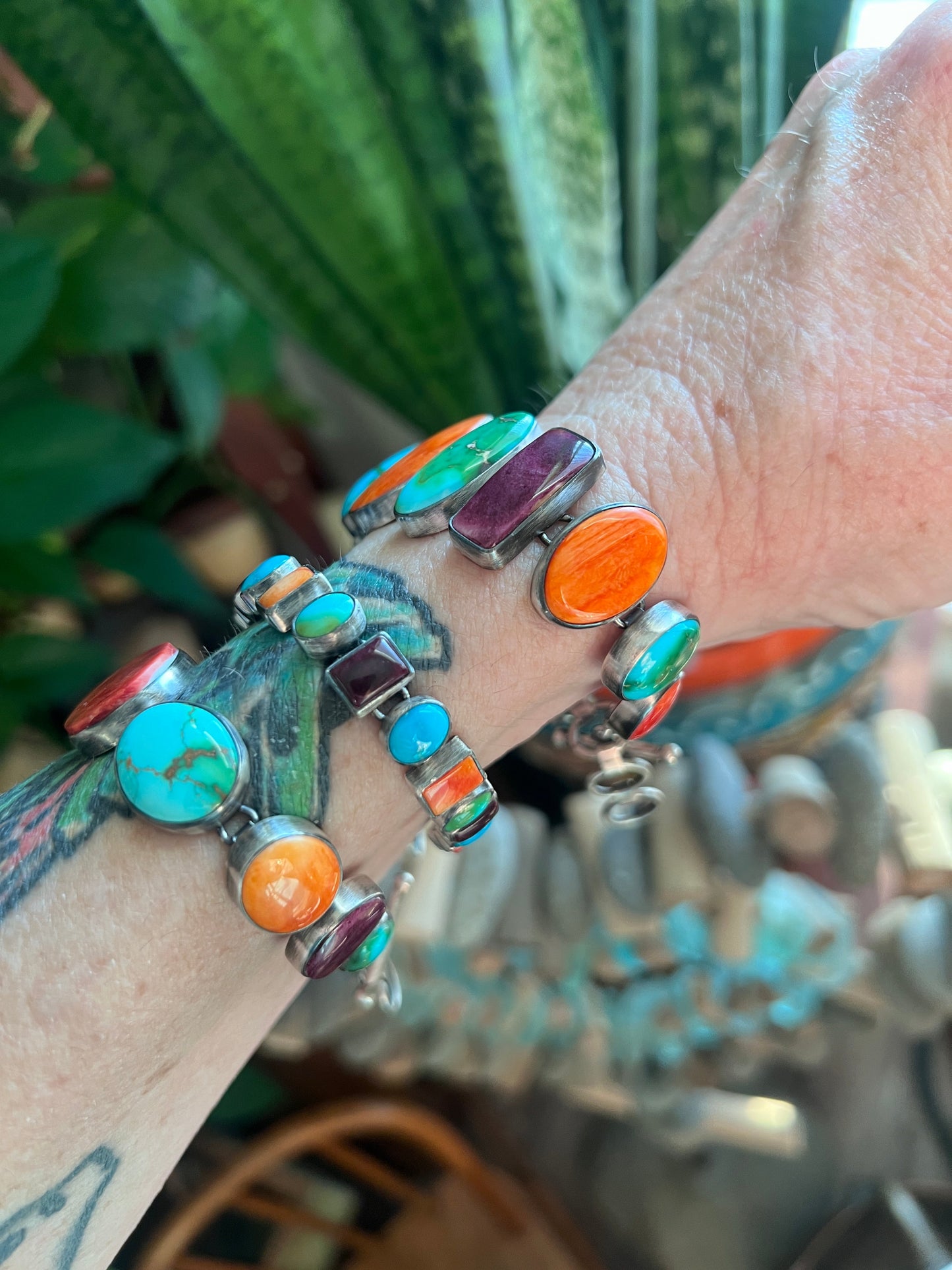 Loretta Delgarito Sterling Silver Electric Rainbow Link Turquoise and Spiny Oyster Bracelet: Ovals, Circles and Pears