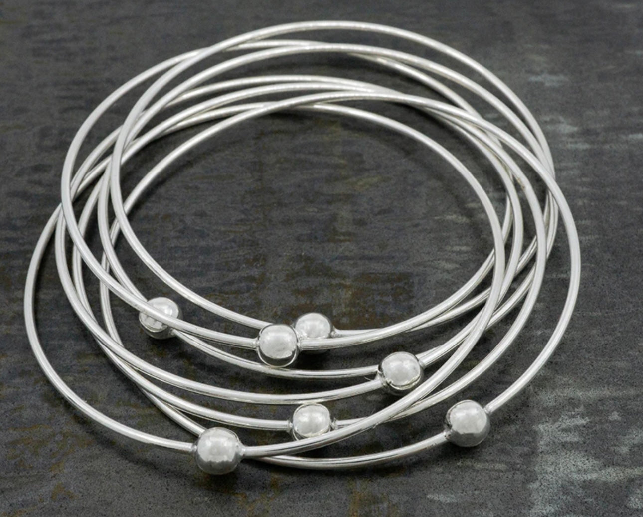 Semanario 7 Bangles Bracelet