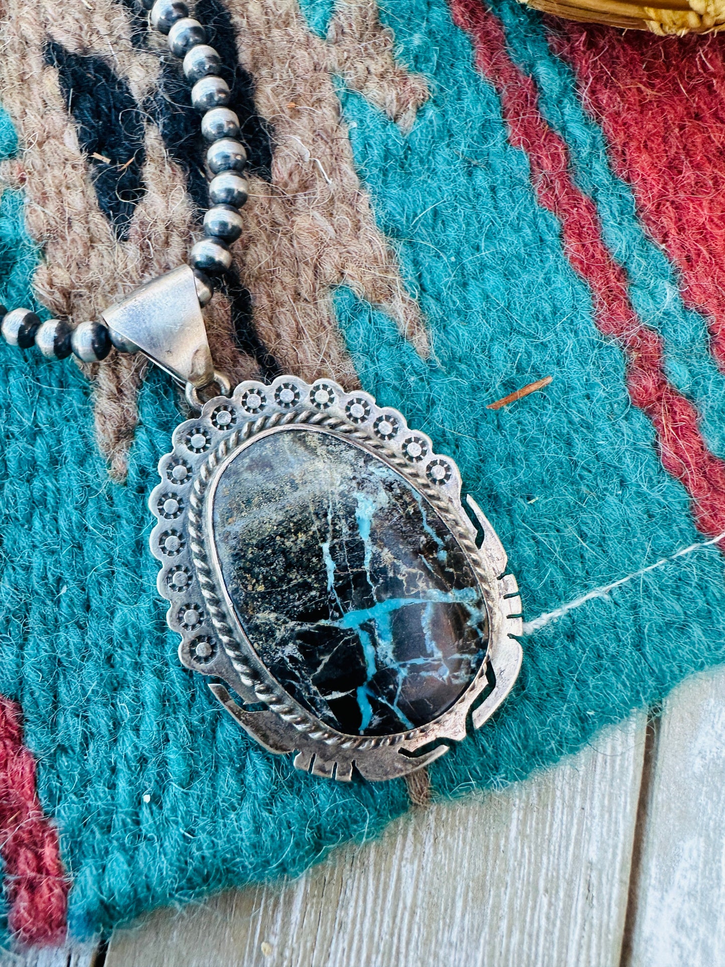 Handcrafted Sterling Silver and Black Jack Turquoise Pendant by Peggy Skeets