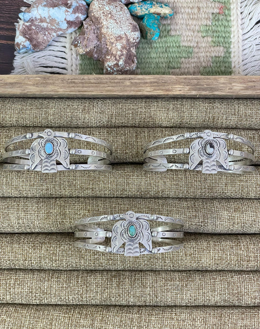 Handmade Sterling Silver White Buffalo, Golden Hills, Kingman Turquoise Thunderbird Bracelet, Signed Nizhoni