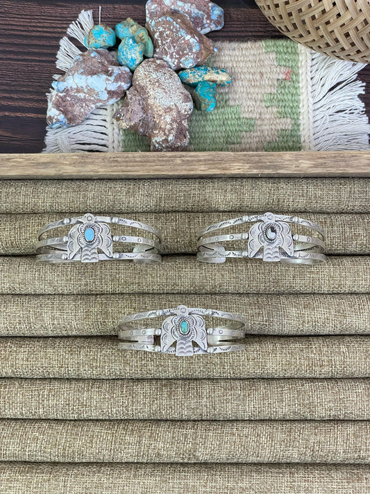 Handmade Sterling Silver White Buffalo, Golden Hills, Kingman Turquoise Thunderbird Bracelet, Signed Nizhoni