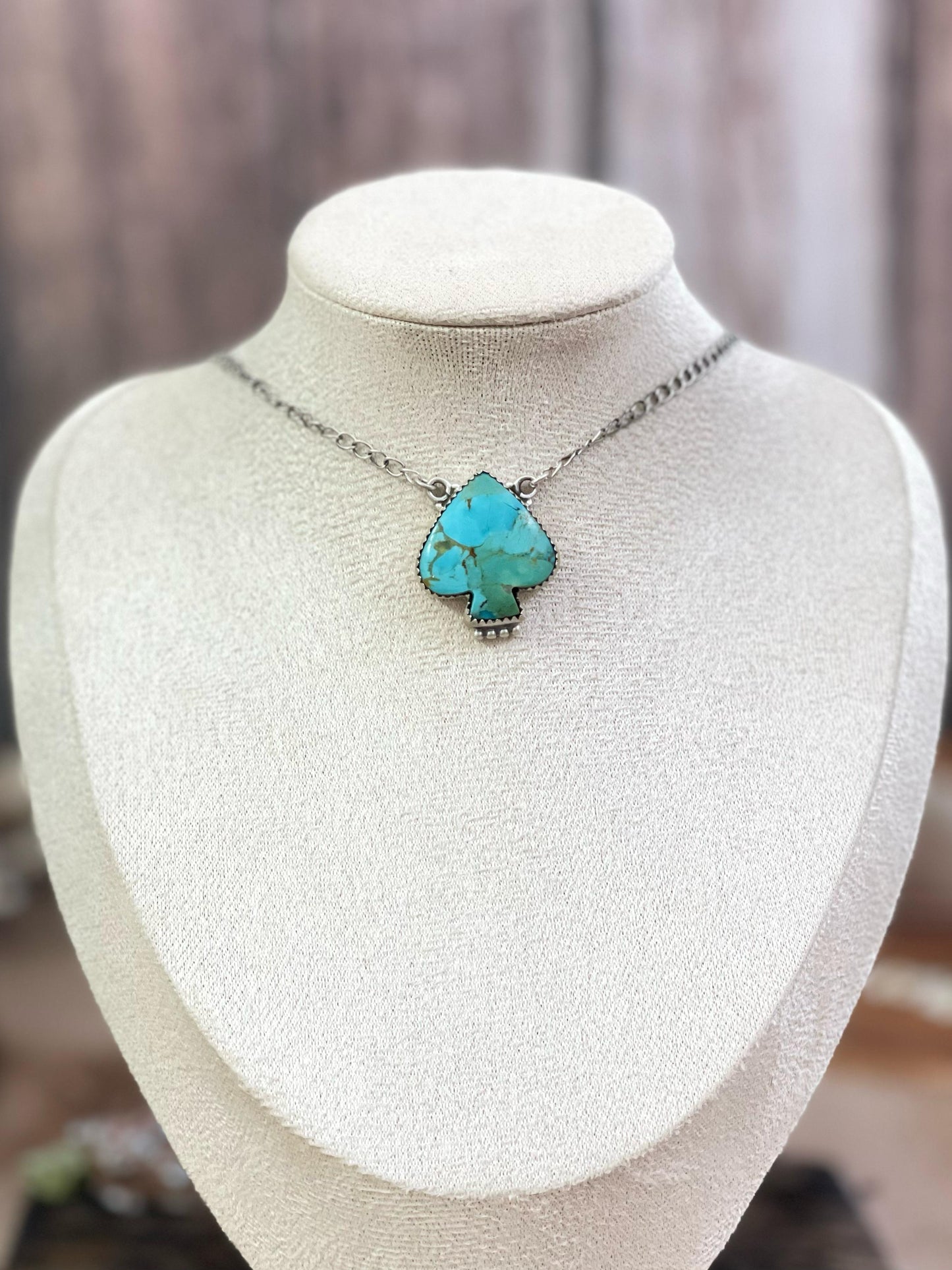 Handmade Sterling Silver White Buffalo, Kingman, Royston Turquoise Spade Necklace with Signed Nizhoni
