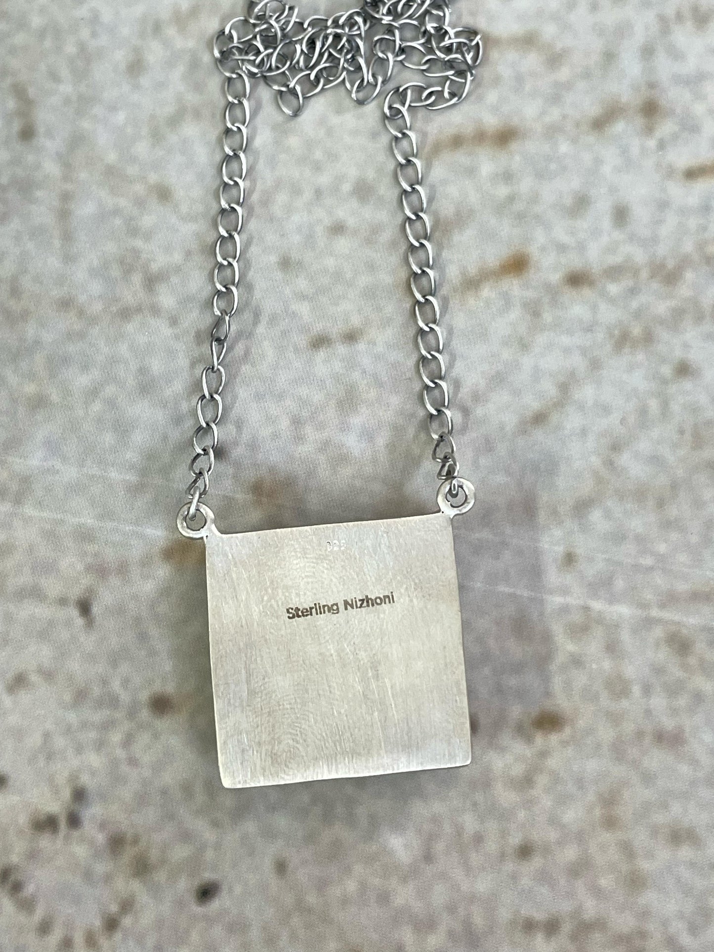 Handmade Sterling Silver White Buffalo Turquoise Necklace with Signed Nizhoni