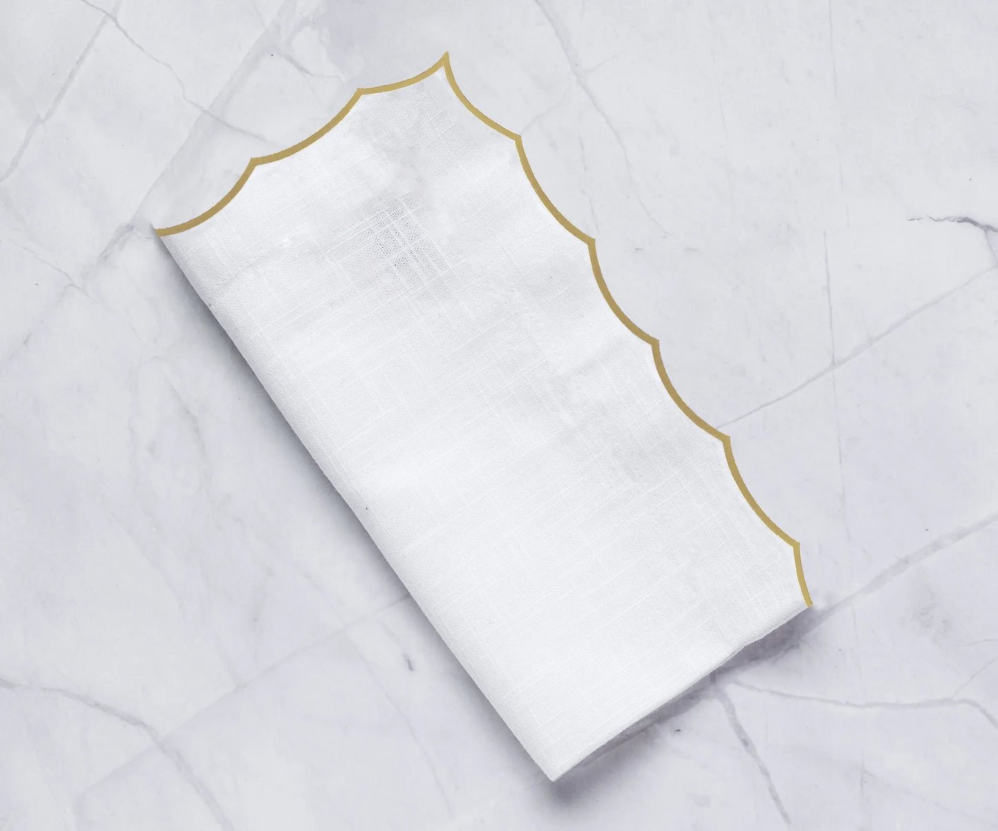 White scalloped napkins for weddings