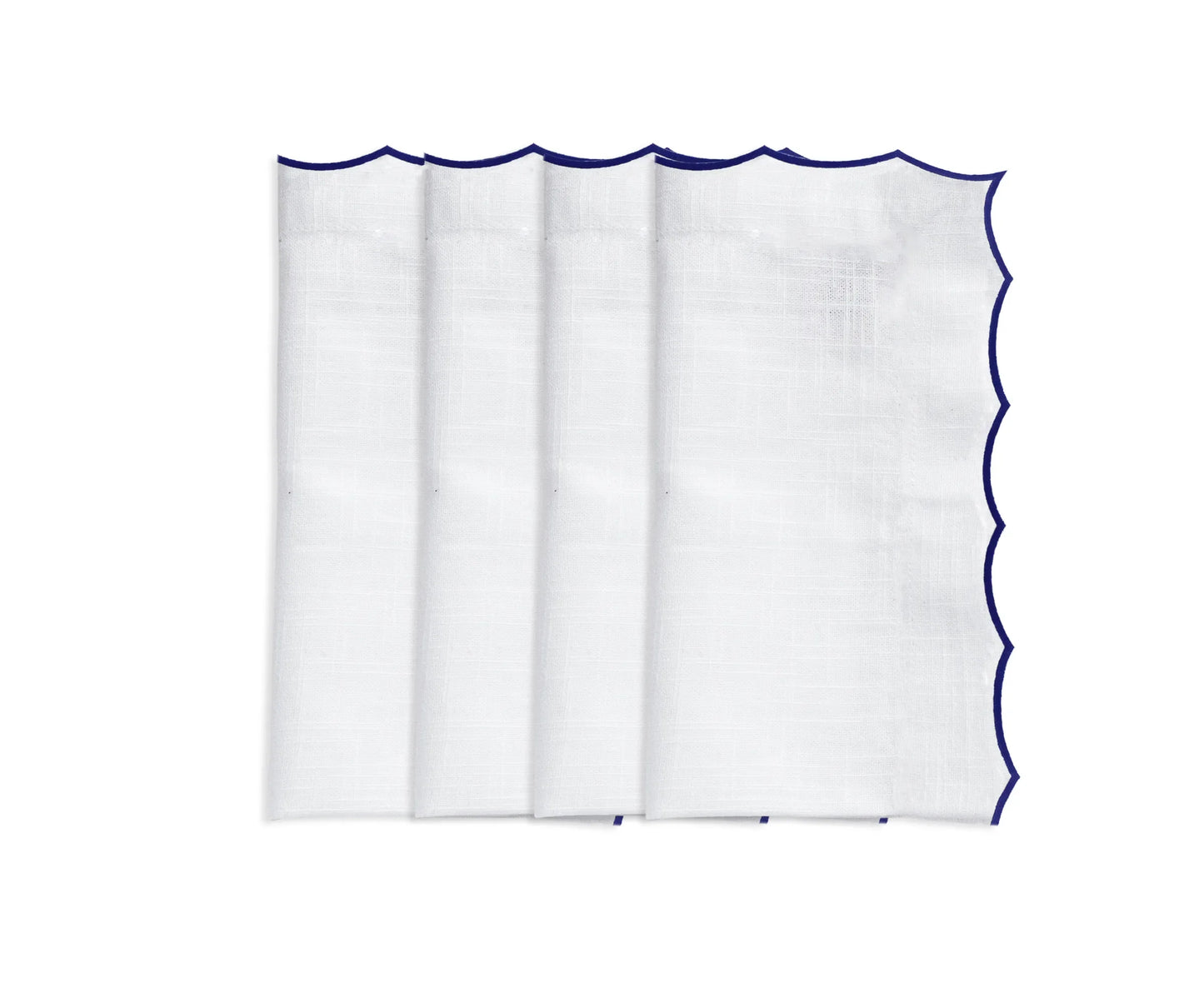 White scalloped napkins for weddings