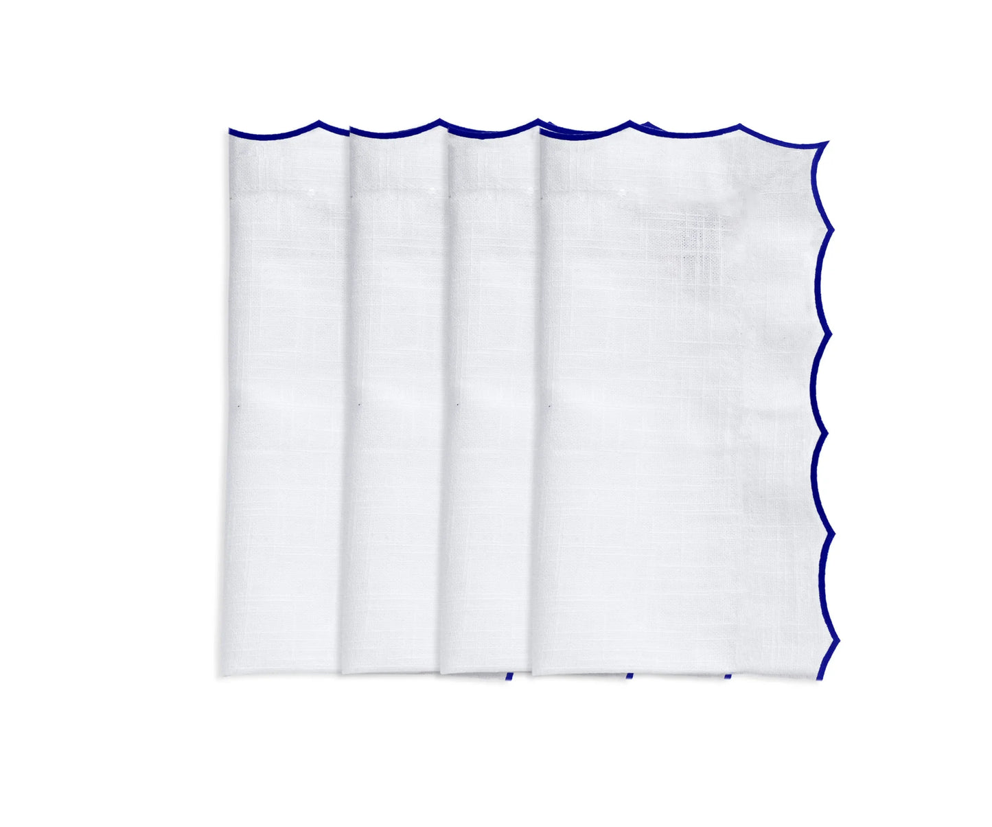 White scalloped napkins for weddings