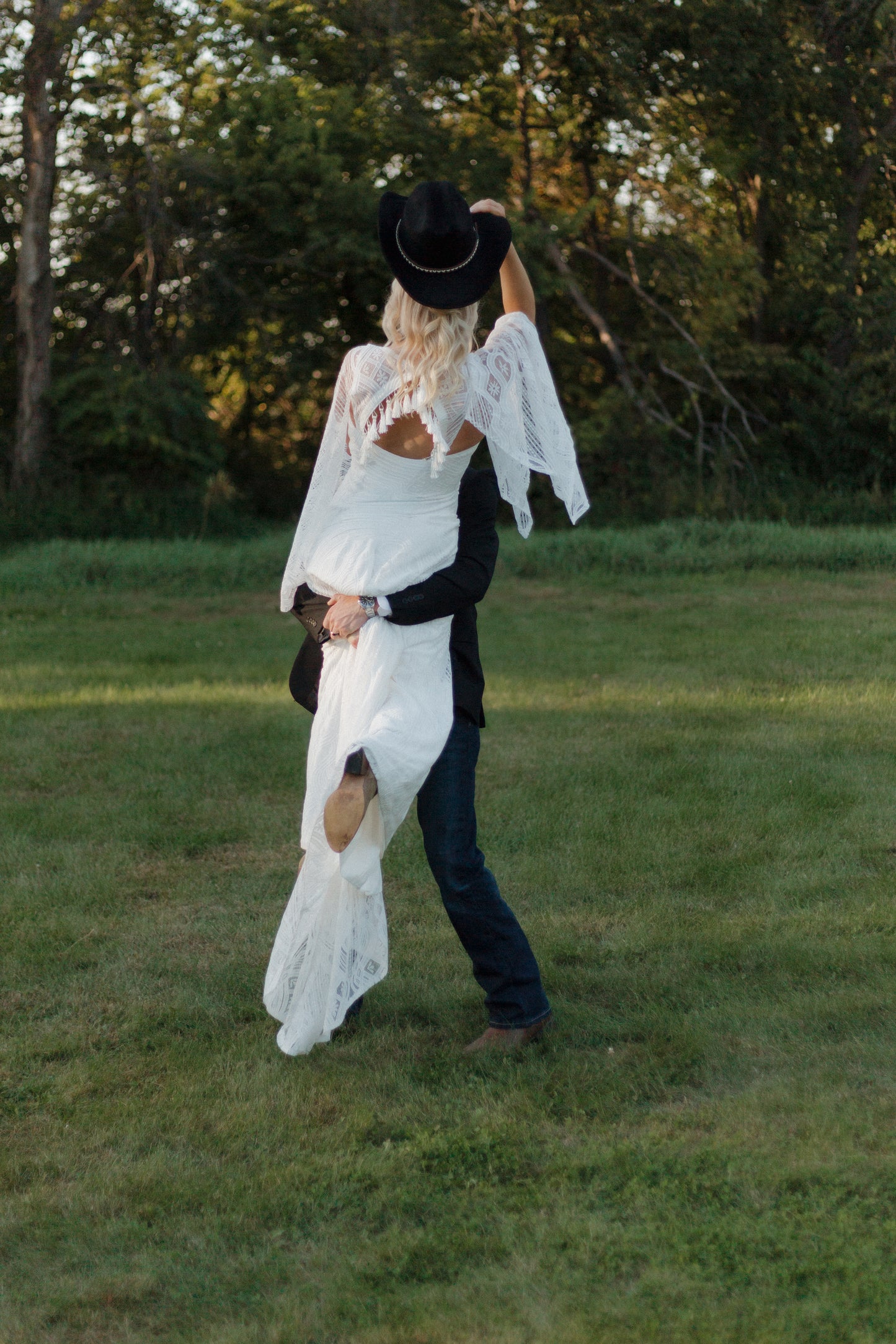 The Wilson Gown – Boho Lace Fit-and-Flare Wedding Dress with Fringe Back & Cape Sleeves