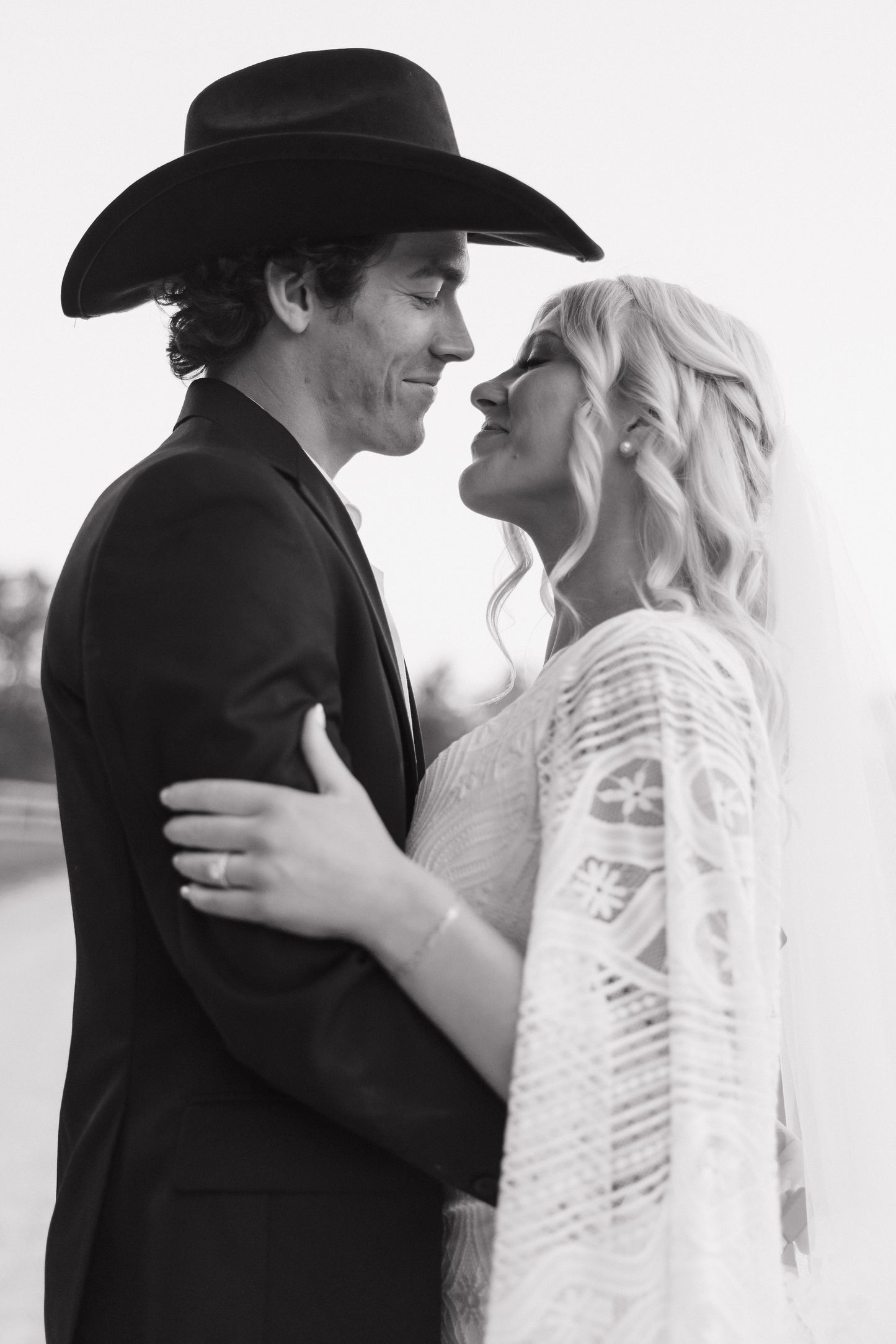 The Wilson Gown – Boho Lace Fit-and-Flare Wedding Dress with Fringe Back & Cape Sleeves