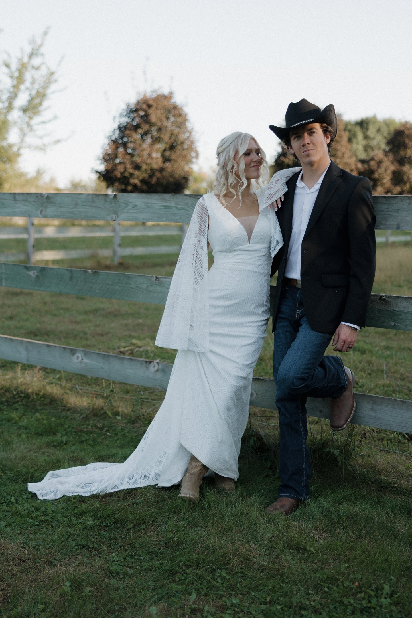 The Wilson Gown – Boho Lace Fit-and-Flare Wedding Dress with Fringe Back & Cape Sleeves