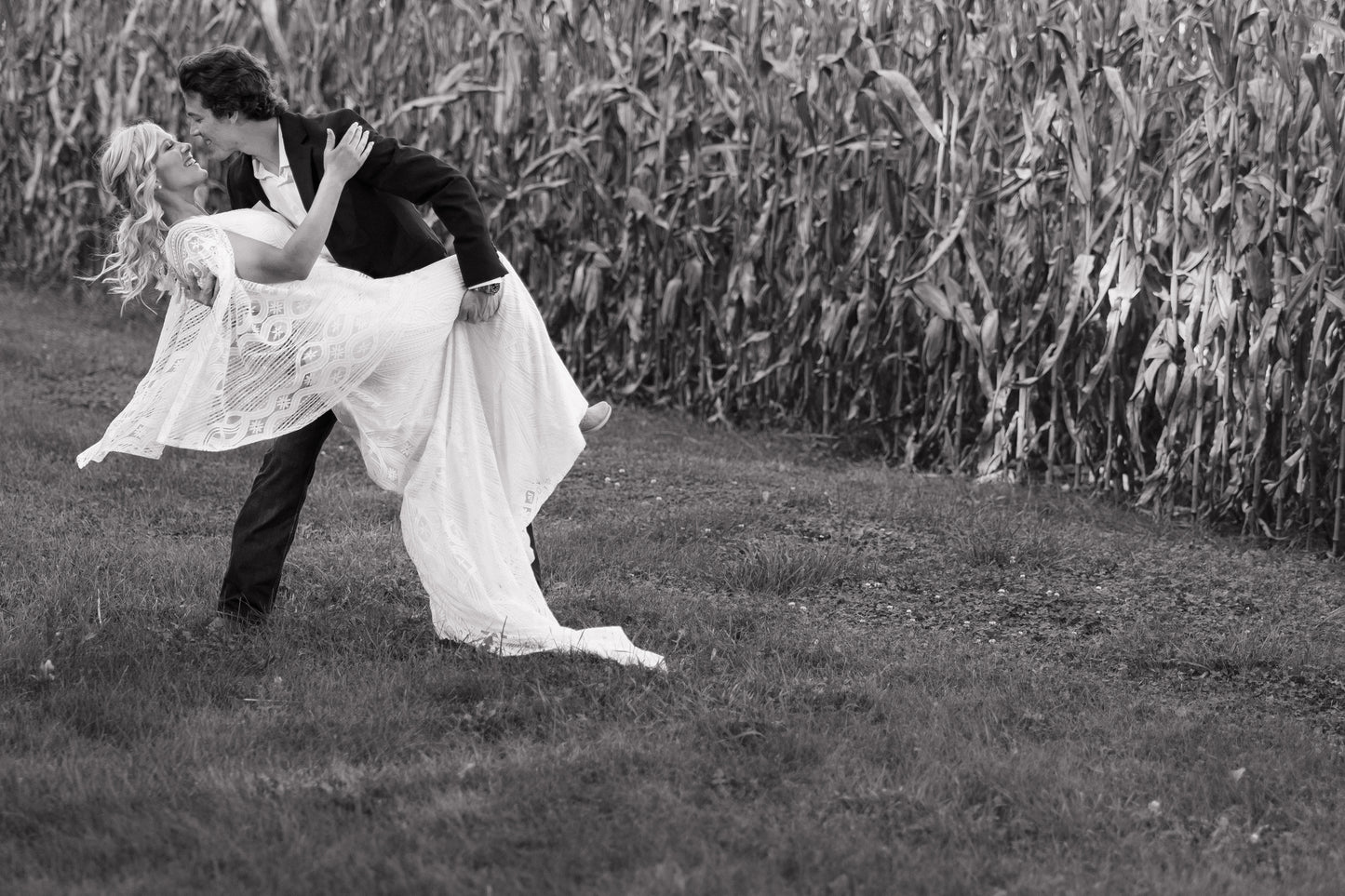 The Wilson Gown – Boho Lace Fit-and-Flare Wedding Dress with Fringe Back & Cape Sleeves