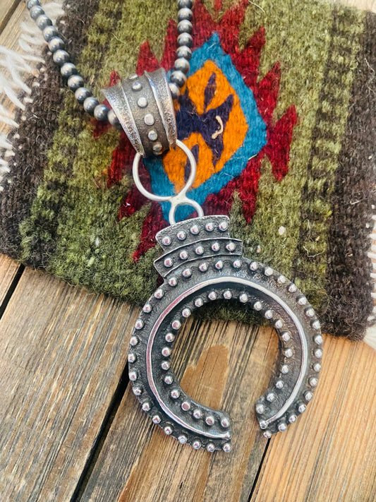 Handcrafted Sterling Silver Ball Cast Naja by Delbert Arviso