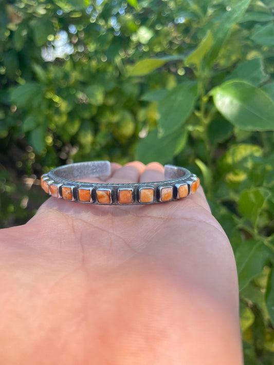 “The Must Have” Handcrafted Orange Spiny & Sterling Silver Cuff Bracelet Signed