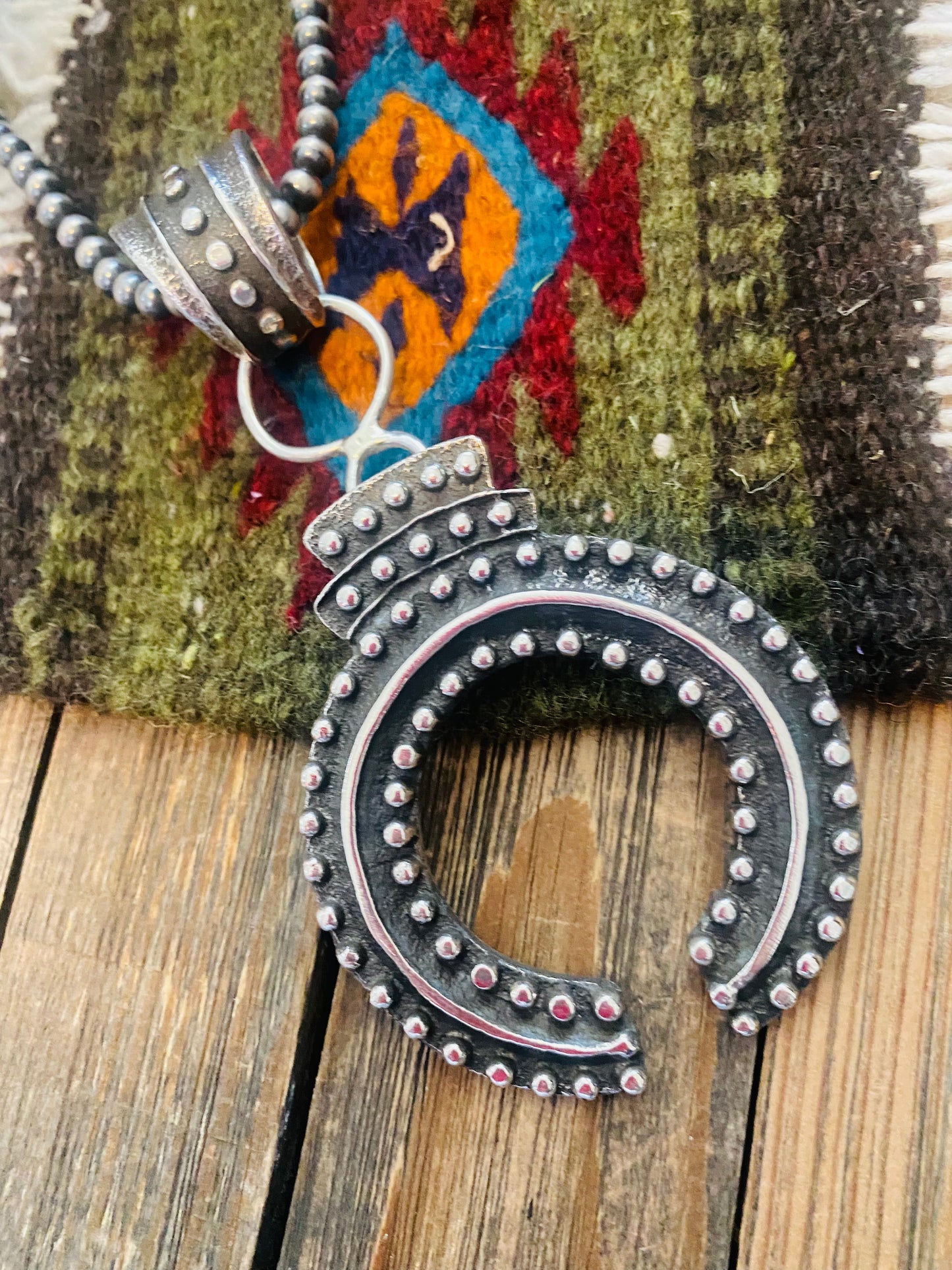 Handcrafted Sterling Silver Ball Cast Naja by Delbert Arviso