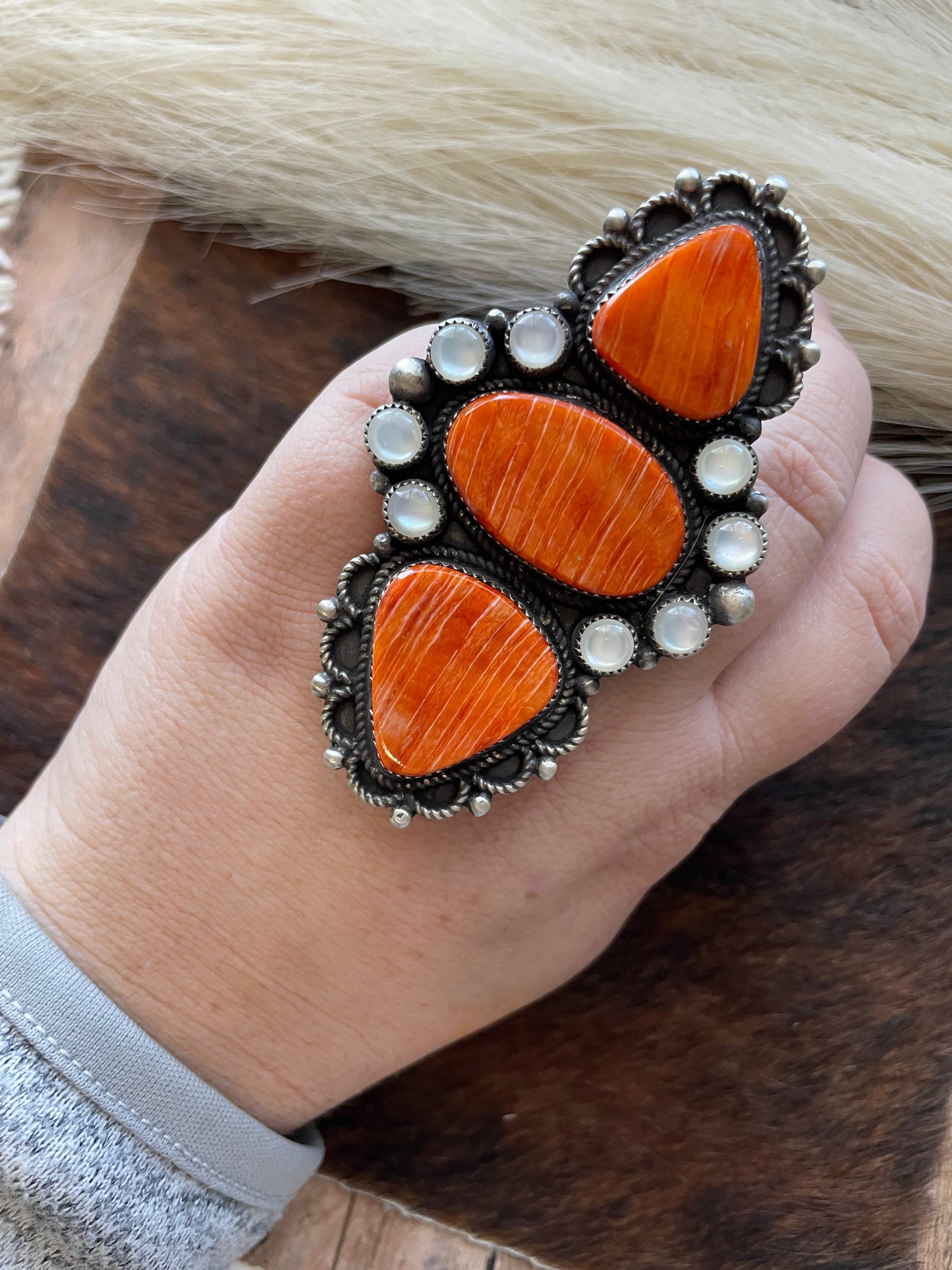 Devon Brown Handcrafted Sterling, Mother of Pearl Orange Spiny ring adjustable