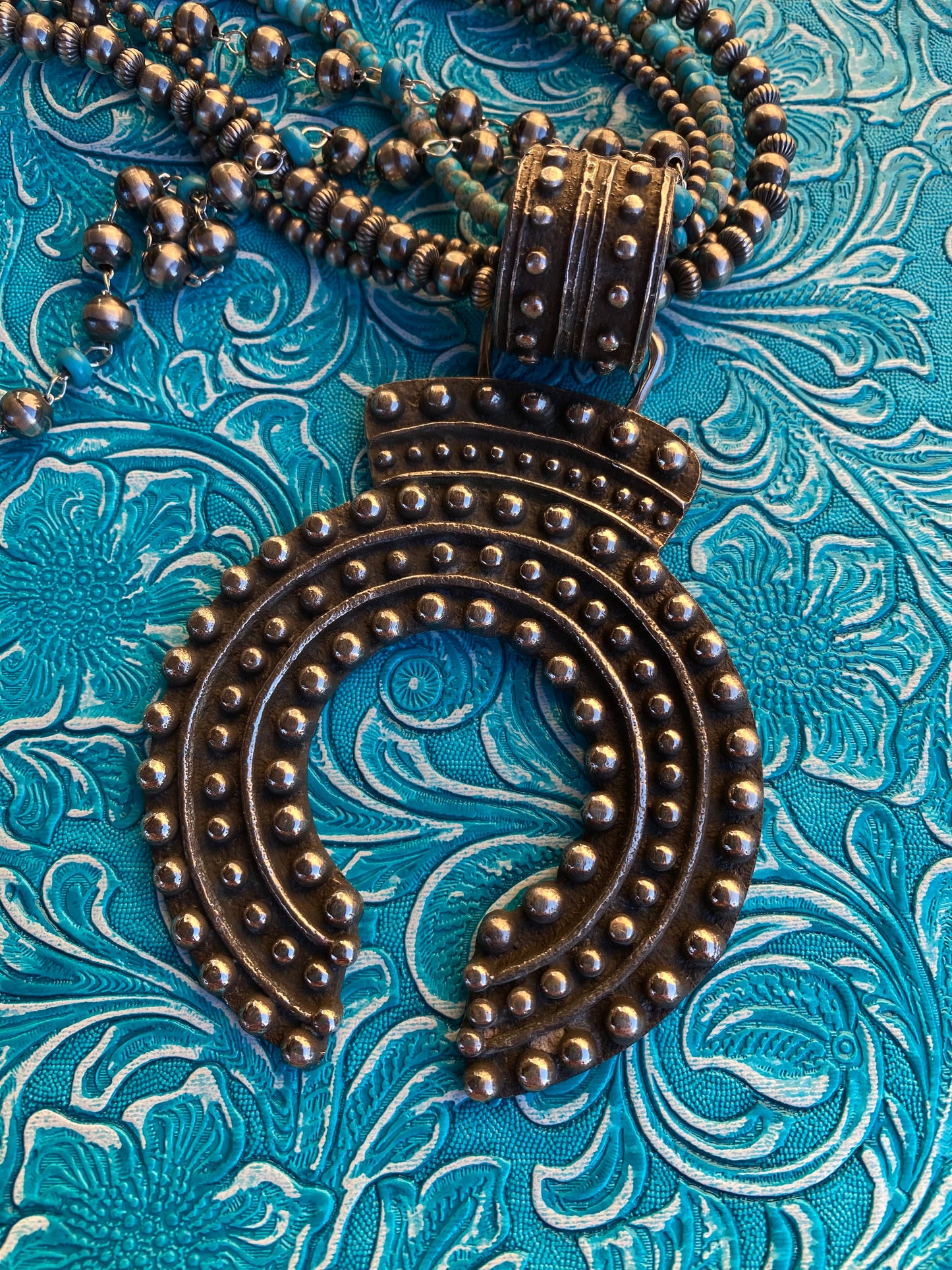 Handcrafted Sterling Silver Ball Cast Naja by Delbert Arviso