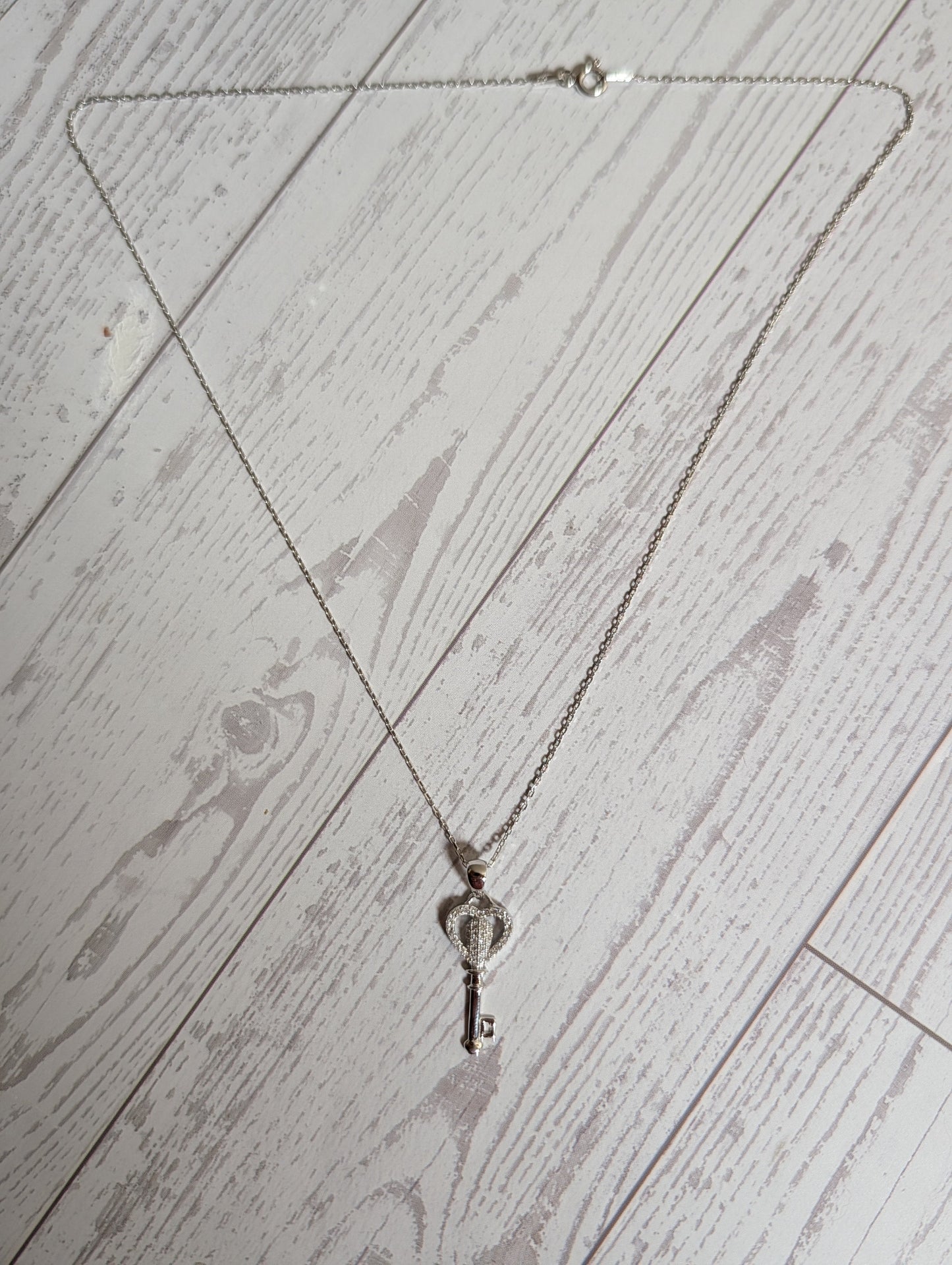 CZ Heart Shaped Key Pendant On Sterling Silver Necklace