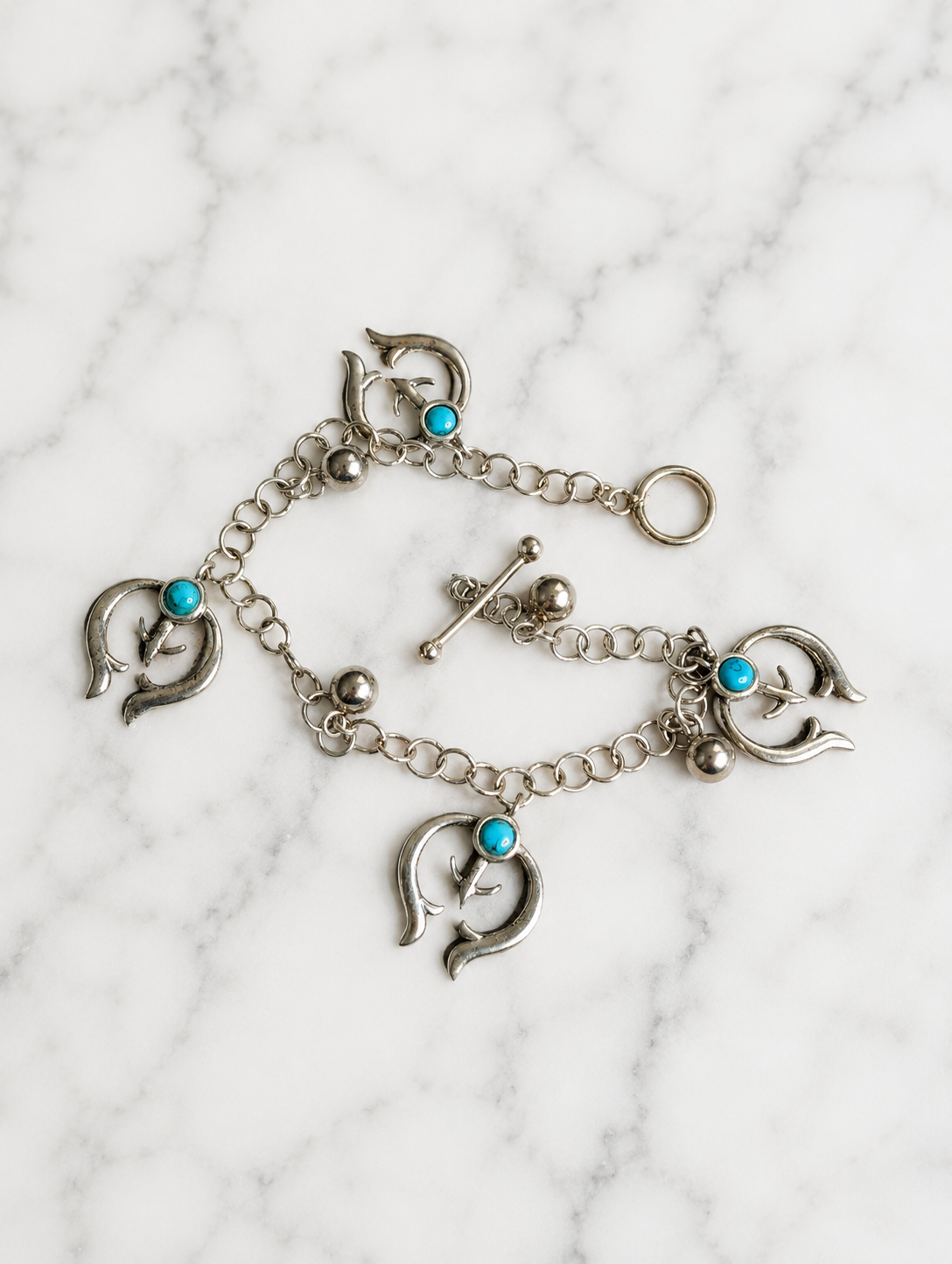 Handcrafted Southwestern Style Turquoise Spirit Naja Sterling Silver Charm Bracelet