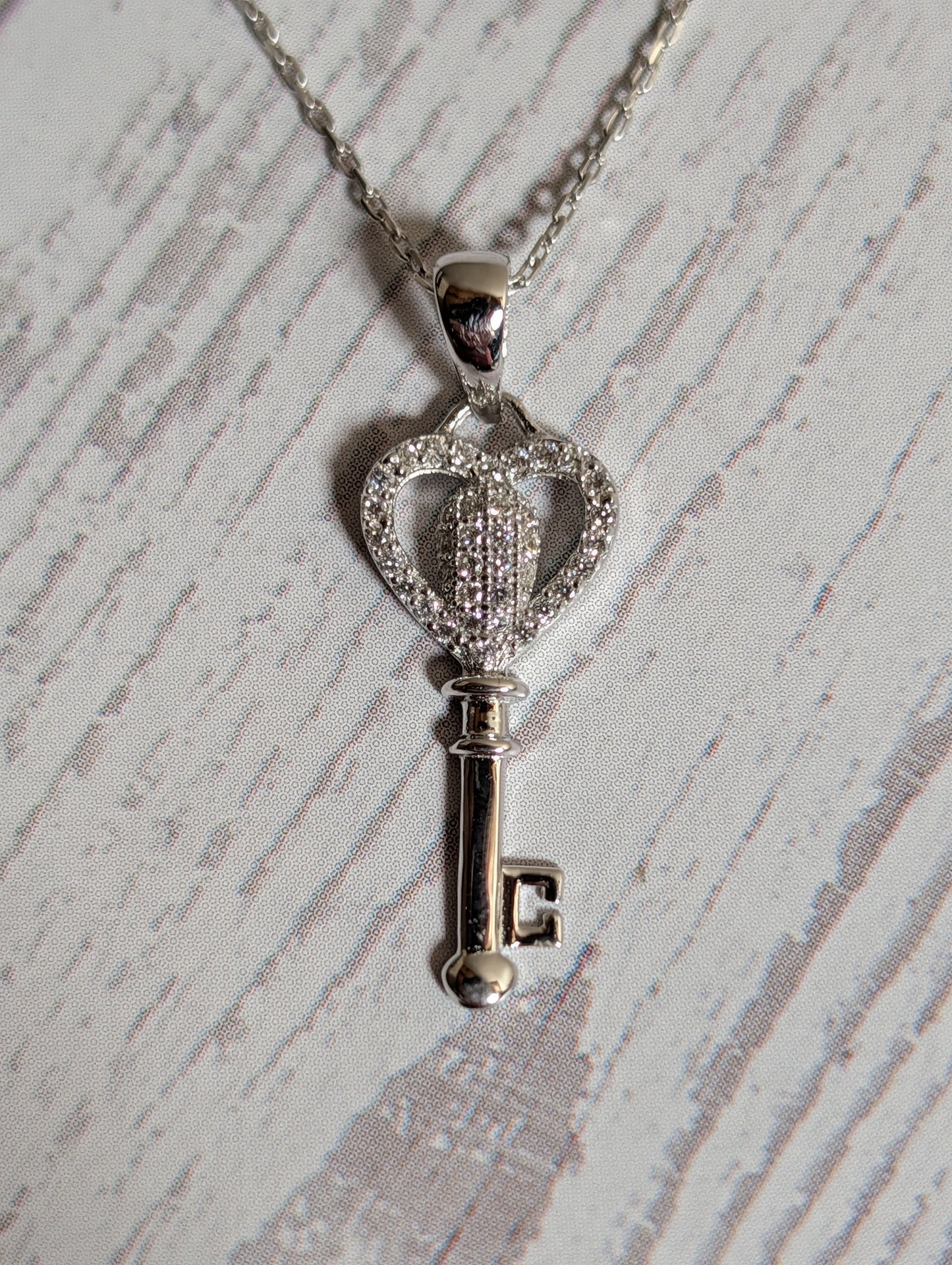 CZ Heart Shaped Key Pendant On Sterling Silver Necklace